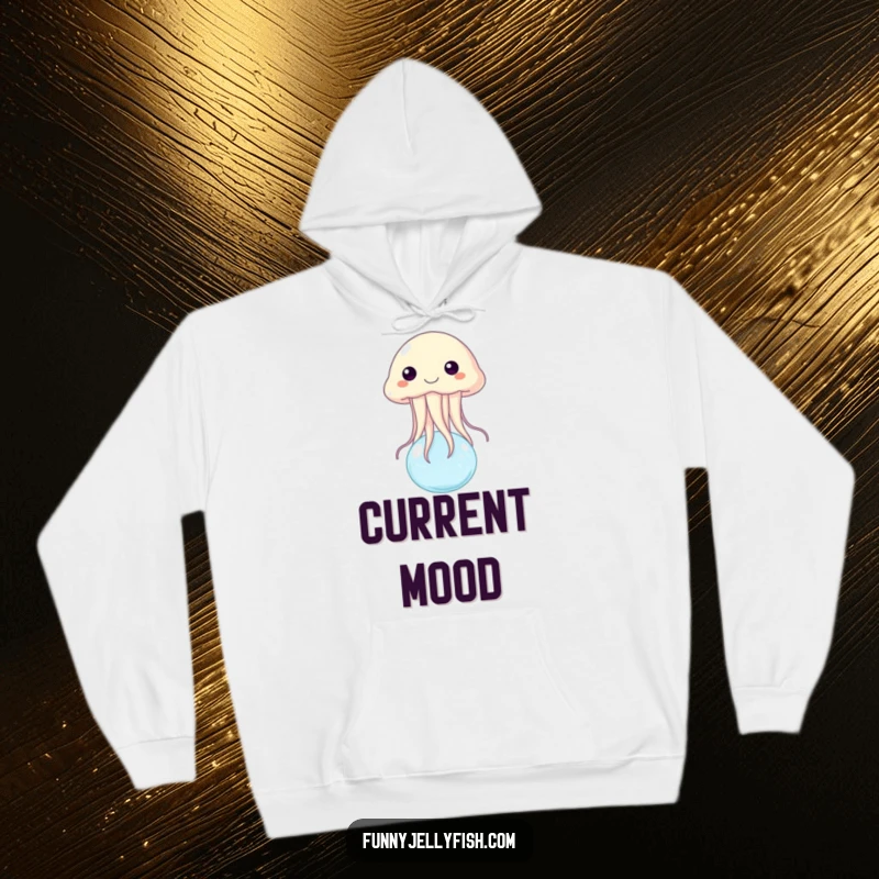 Funny hoodie depicting a beaming jellyfish gracefully bouncing on a miniature, cheerful water bubble, embodying playful aquatic exuberance.