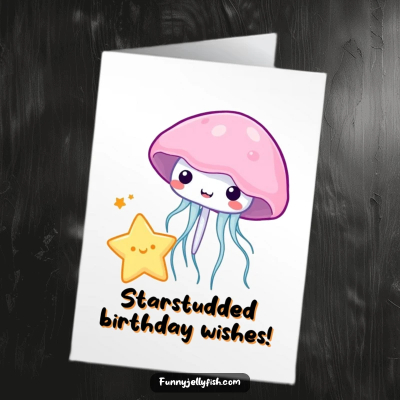 Funny free printable birthday card where a cute kawaii jellyfish uses its bell to playfully bounce a tiny, glowing star.