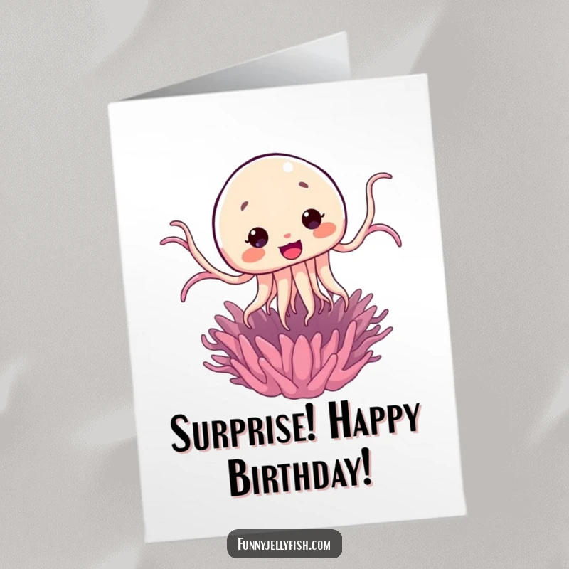 Funny Free Printable Birthday Card showing a Kawaii jellyfish joyfully jumping from a sea anemone, a comical surprise.